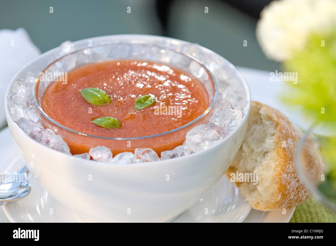 Chilled tomato and basil soup. Stock Photo