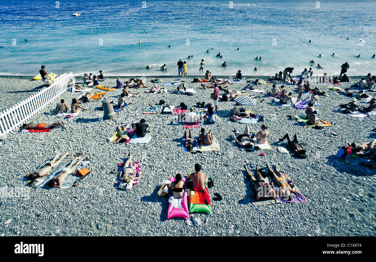 Crowded beach scene in Nice, France Stock Photo
