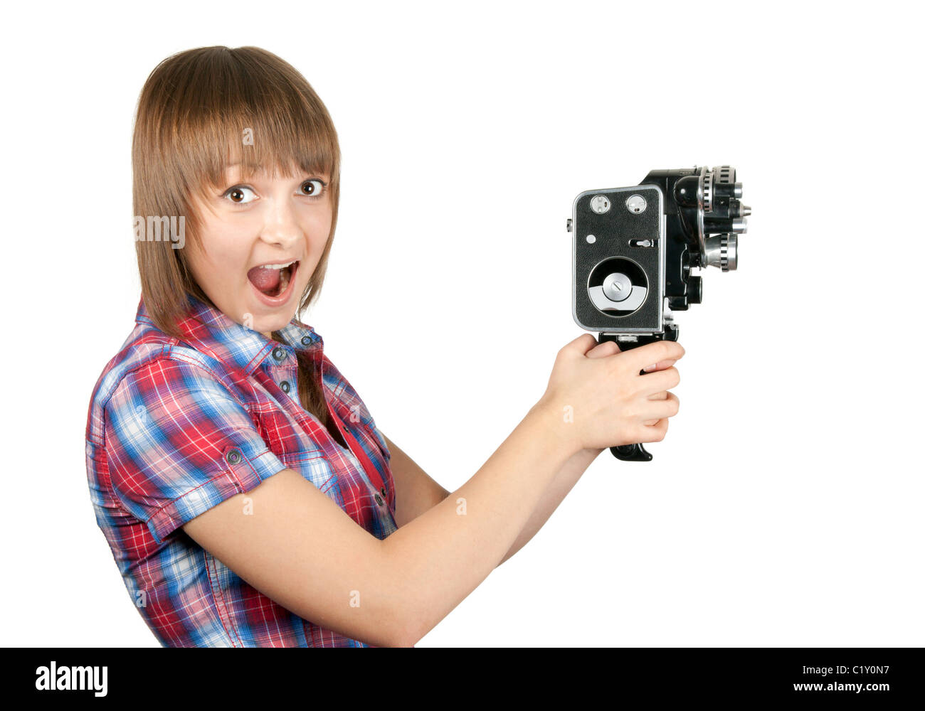 Young girl with old analog photo by camera on white background Stock