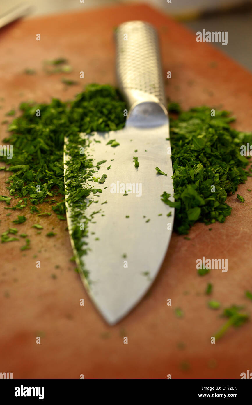 Chopping Board with Knife and Parsley Stock Photo Alamy