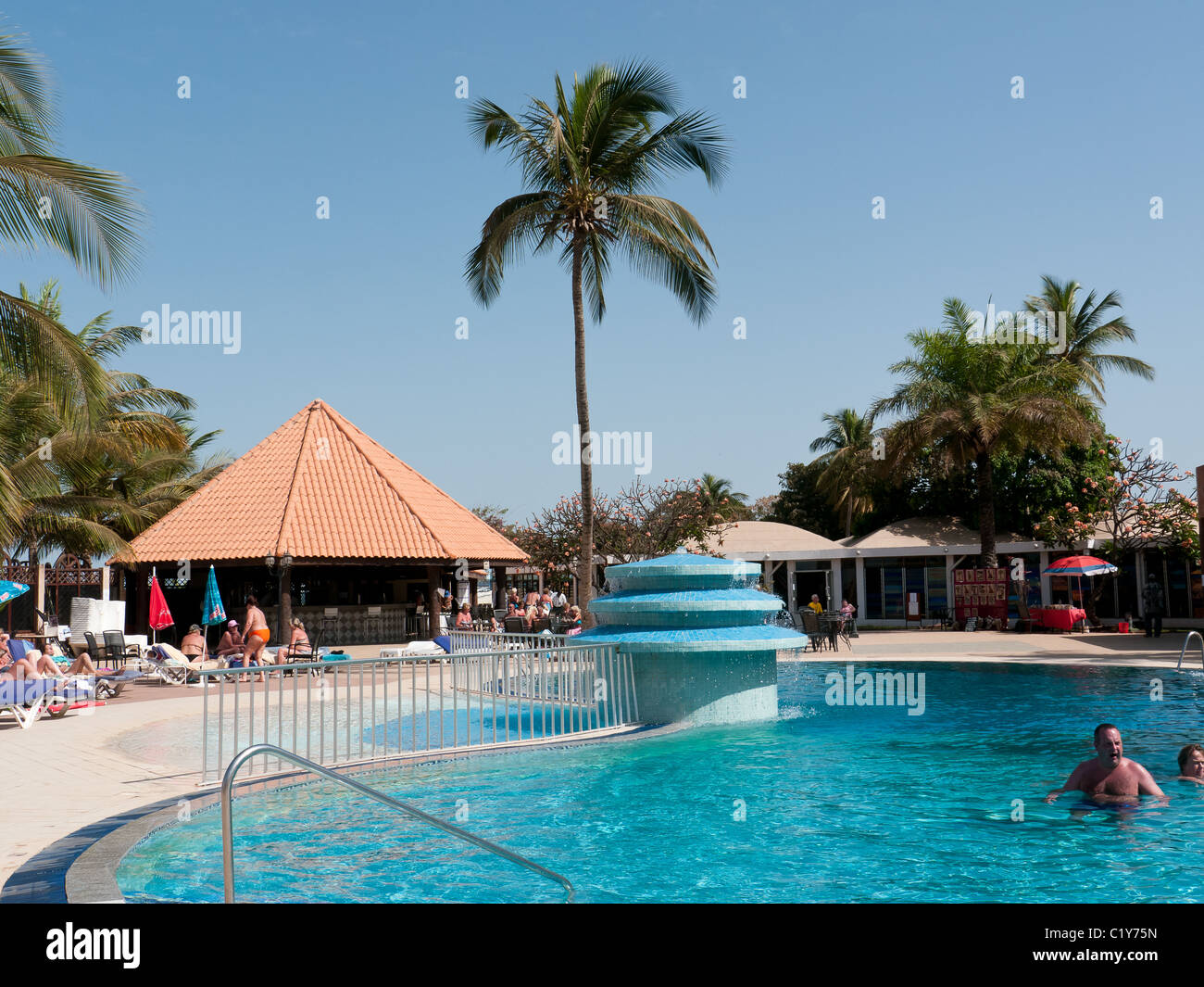 The pool area and sunbeds of the Atlantic Hotel in Banjul, The Gambia, West Africa Stock Photo
