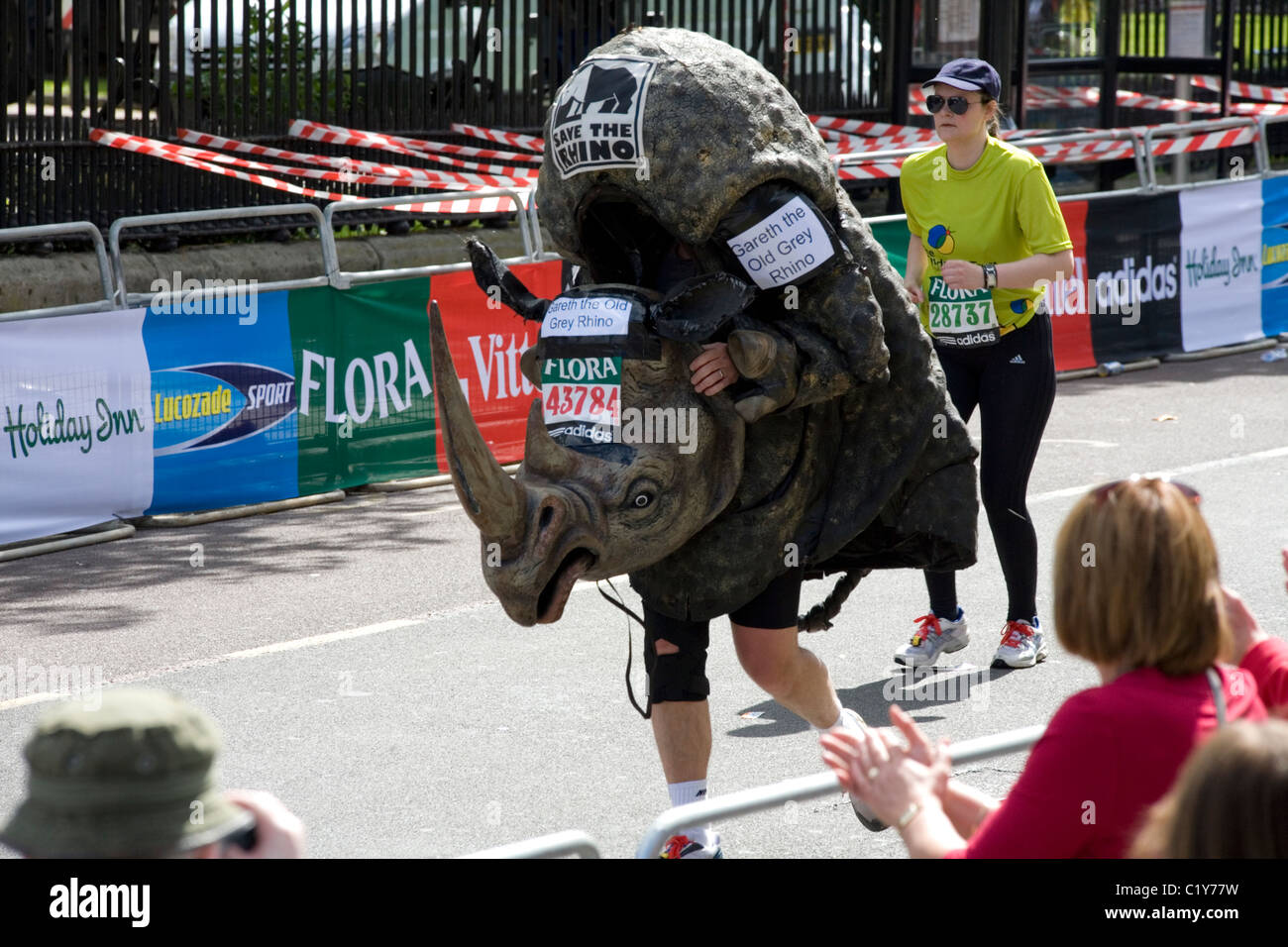 man in rhino costume running in the London marathon Stock Photo