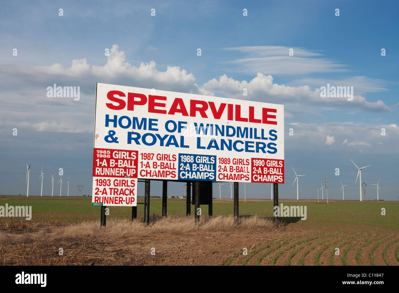 A billboard in Spearville, Kansas proudly recognizing high school sports teams. Stock Photo