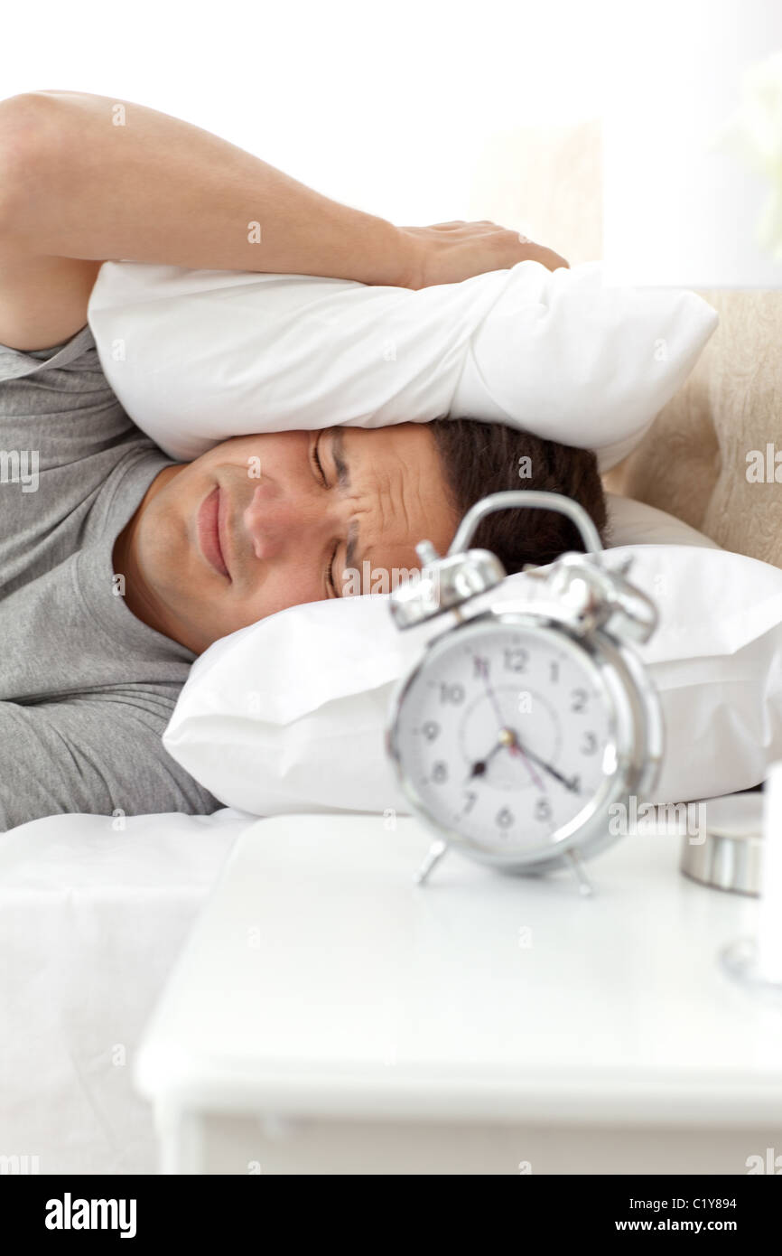 Head under pillow alarm hi-res stock photography and images - Alamy