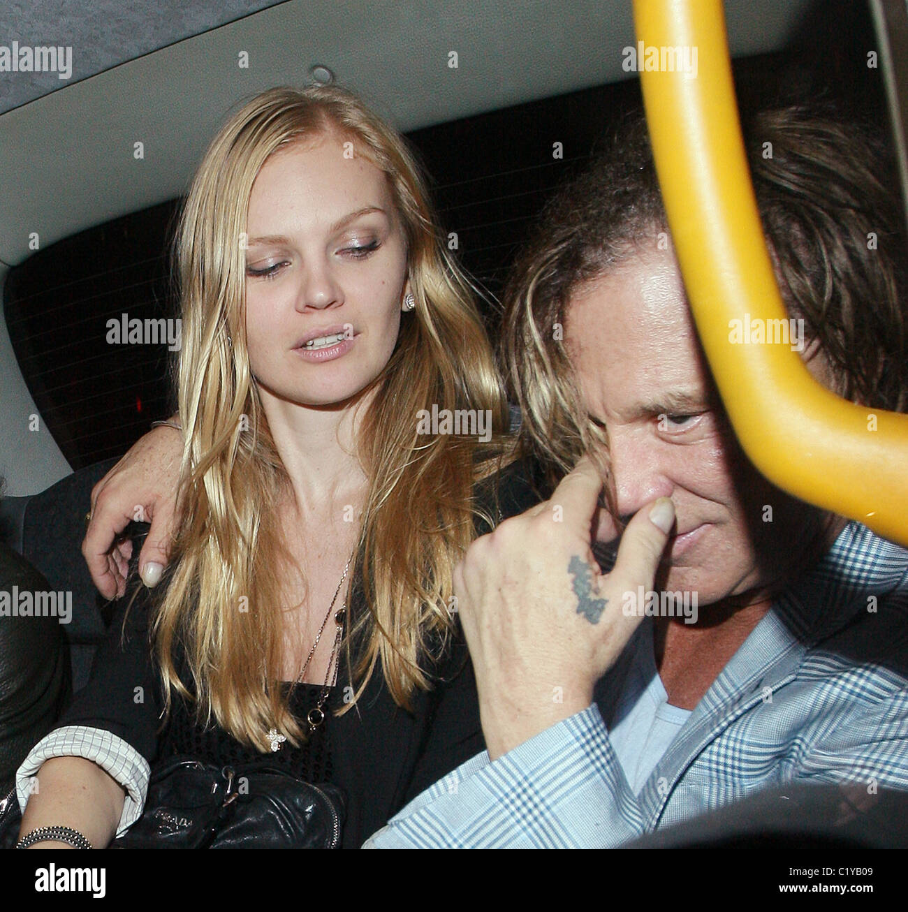 Mickey Rourke leaving Mahiki nightclub with a mystery blonde London ...