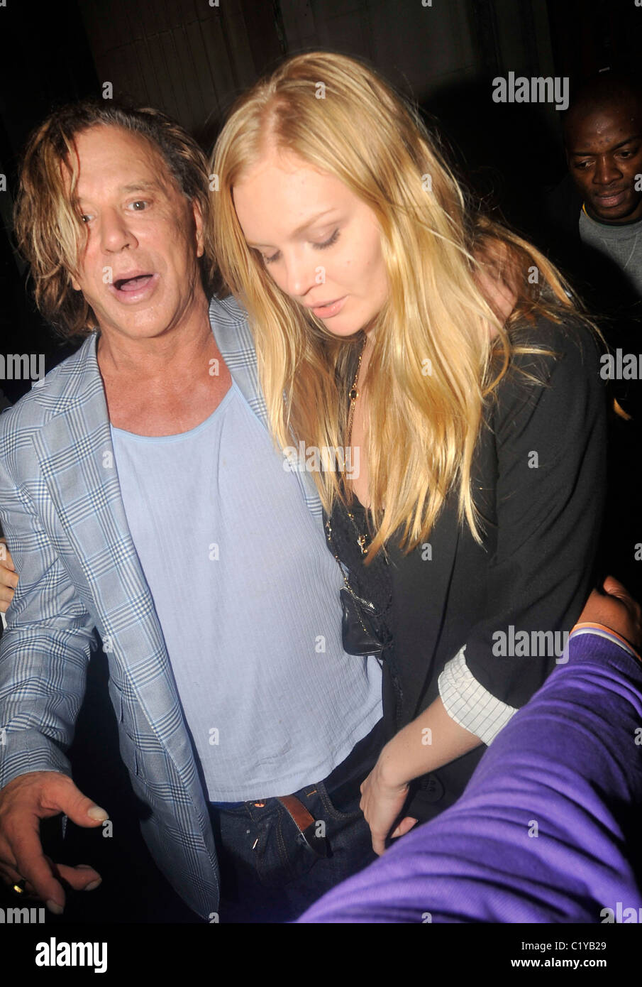 Mickey Rourke leaving Mahiki nightclub with a mystery blonde London ...