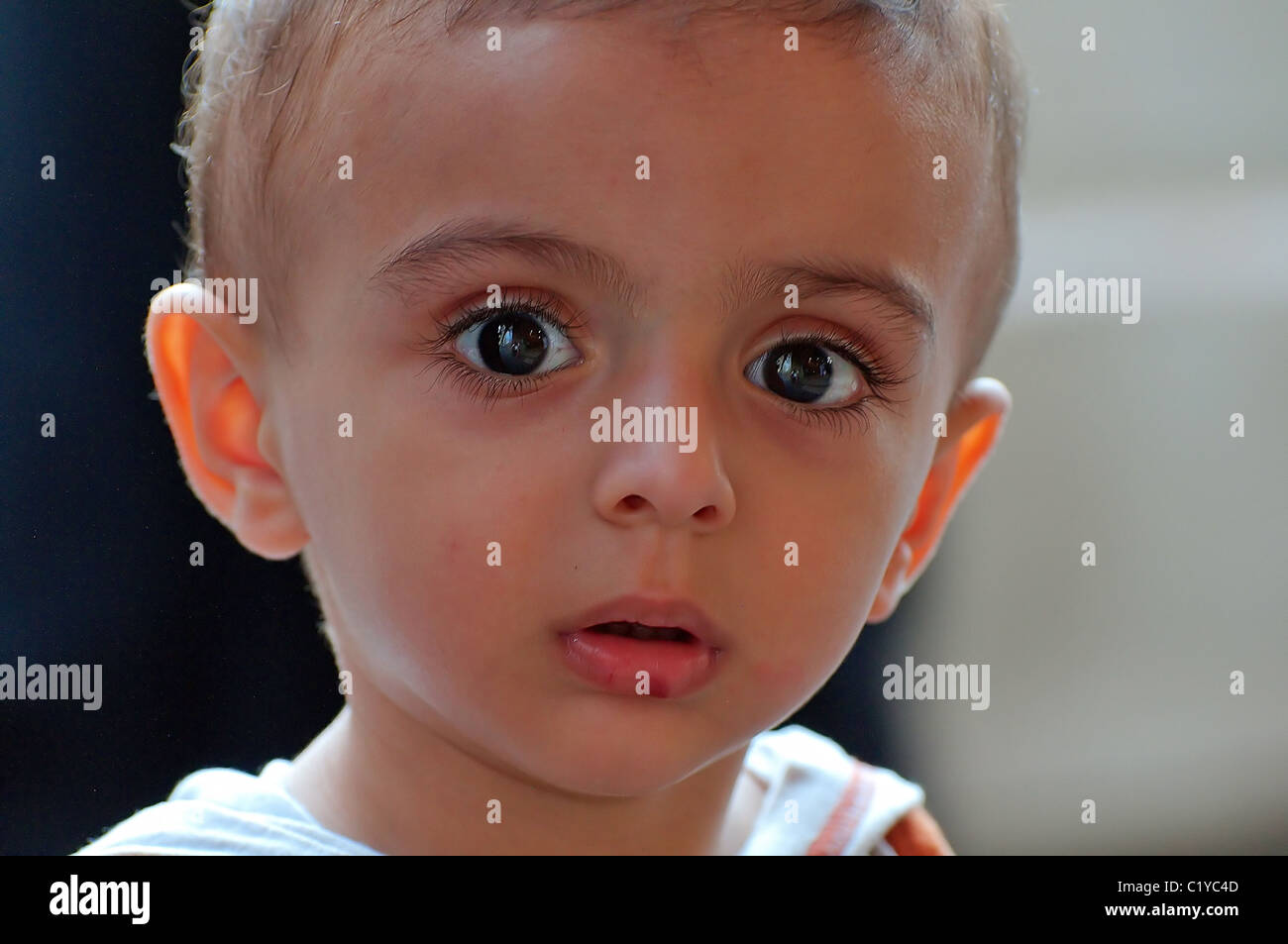 Portrait of a Syrian boy with big, sad eyes, Aleppo, Syria Stock Photo