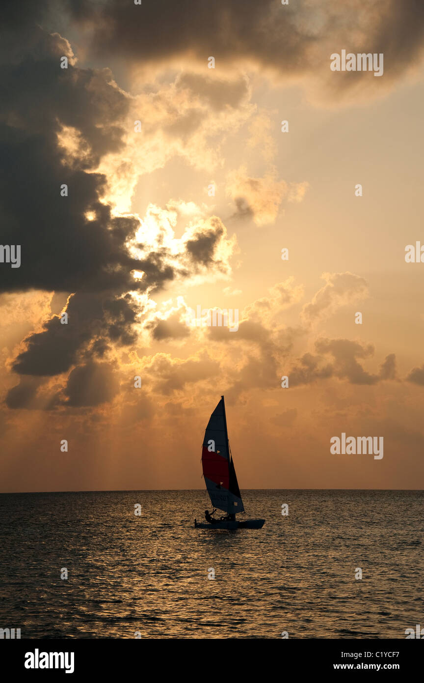 Catamaran sailing in the Maldives sunset Stock Photo Alamy
