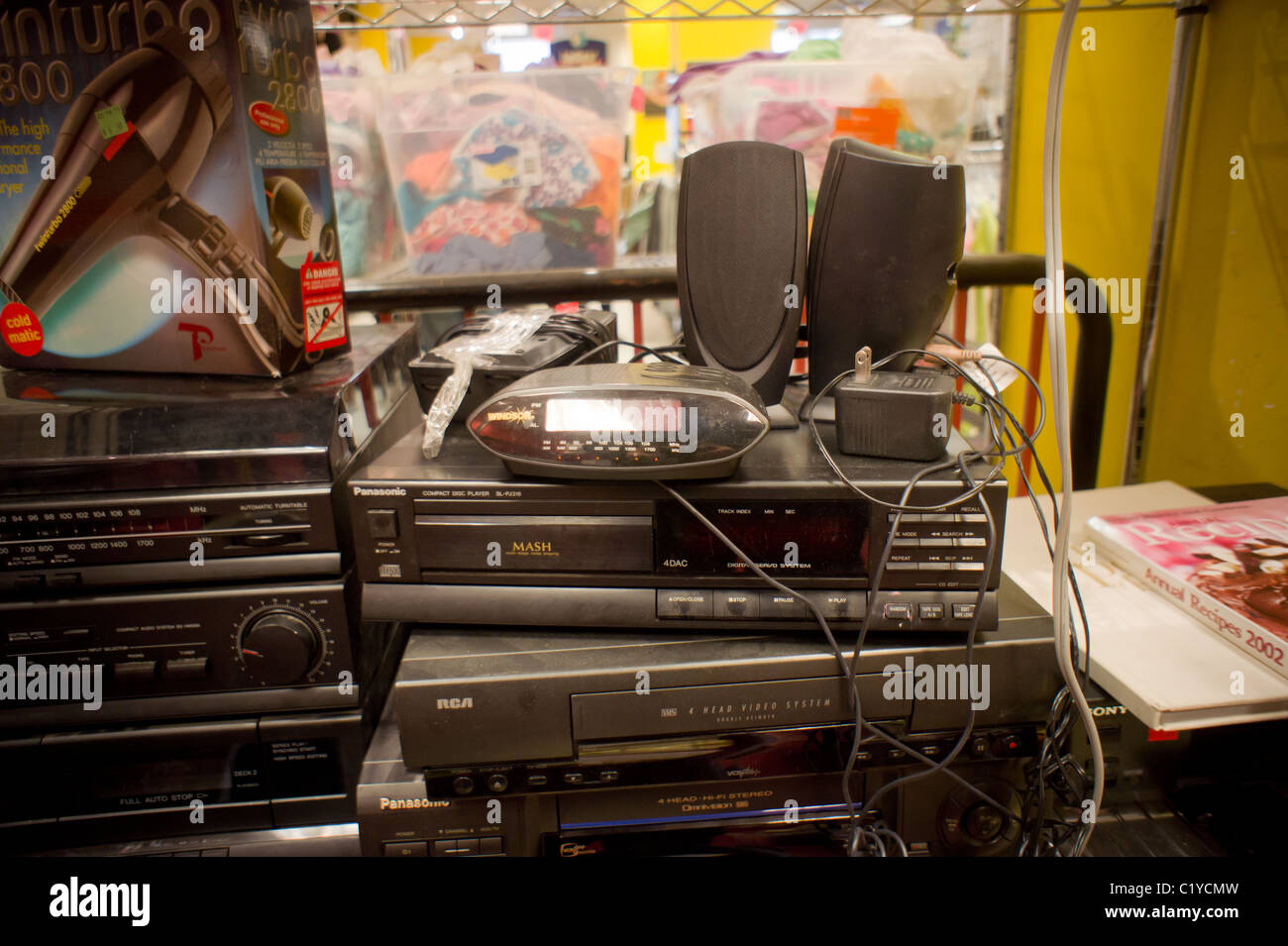 VCR's and other older electronic products are seen in a thrift store in