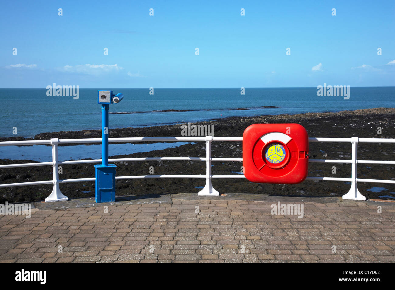 Seaview with lifebouy and coin operated telescope in Aberystwyth Ceredigion Wales UK Stock Photo