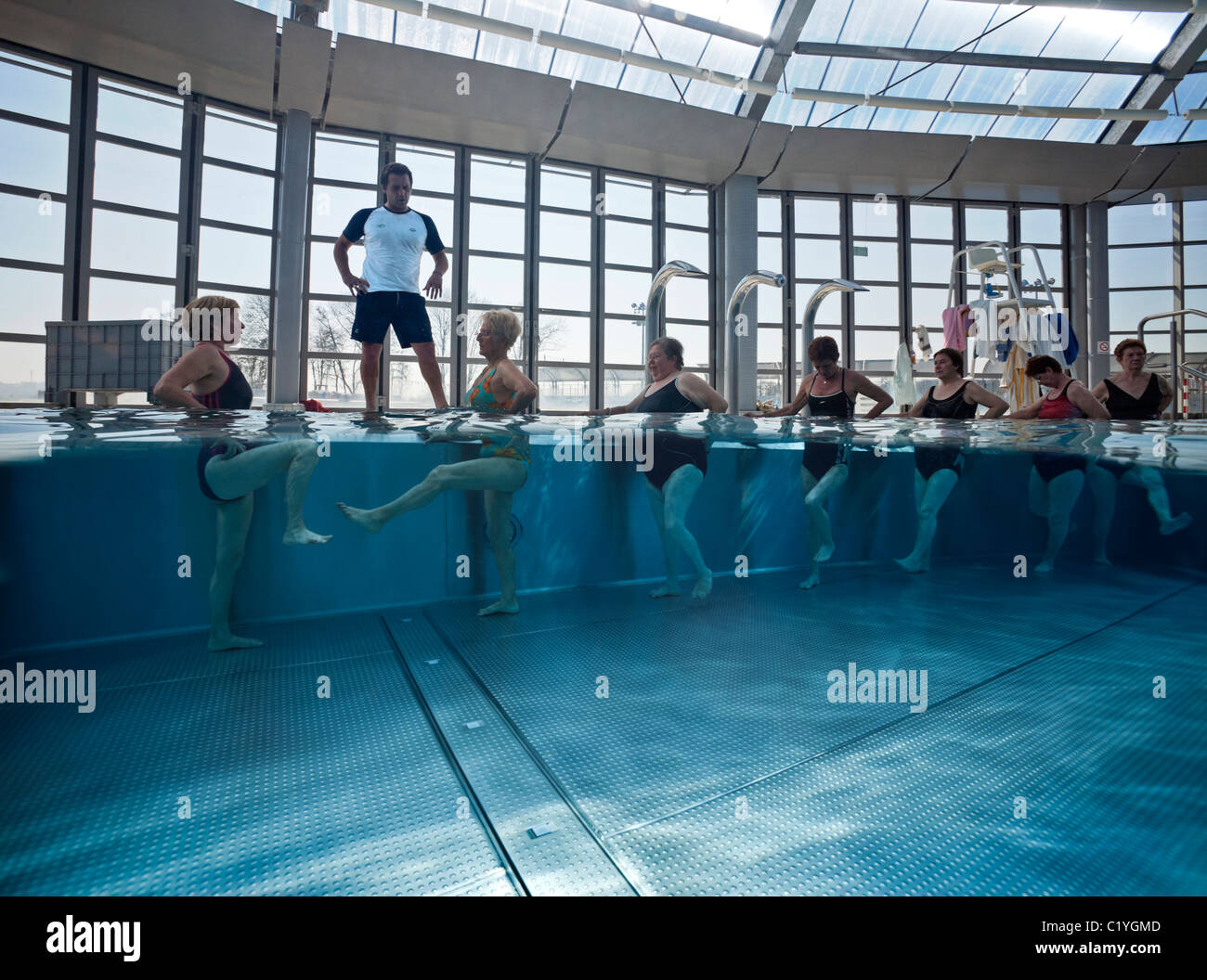 In the Vichy swimming pool, a water aerobics session for senior citizens (France). Stock Photo
