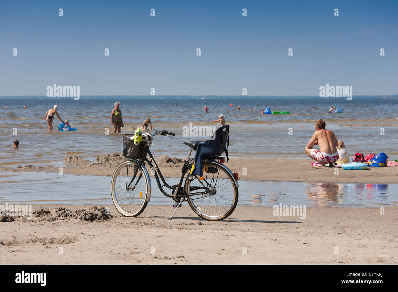 Bicycle by Pärnu beach in Estonia Stock Photo