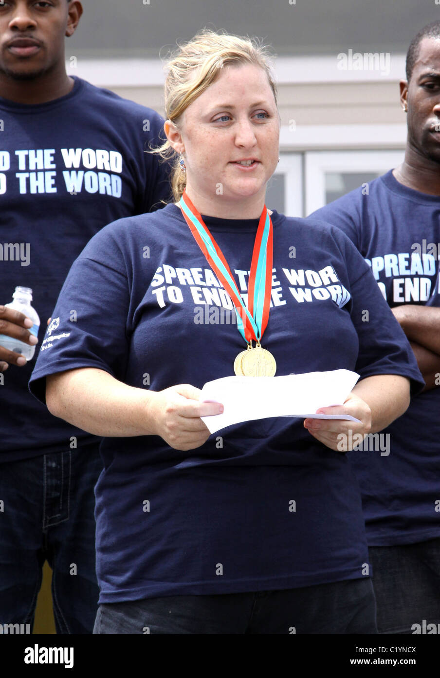 Special Olympic Champion Deborah 'Spread the word to end the word' for the special Olympics held at Boys and Girls club teen Stock Photo