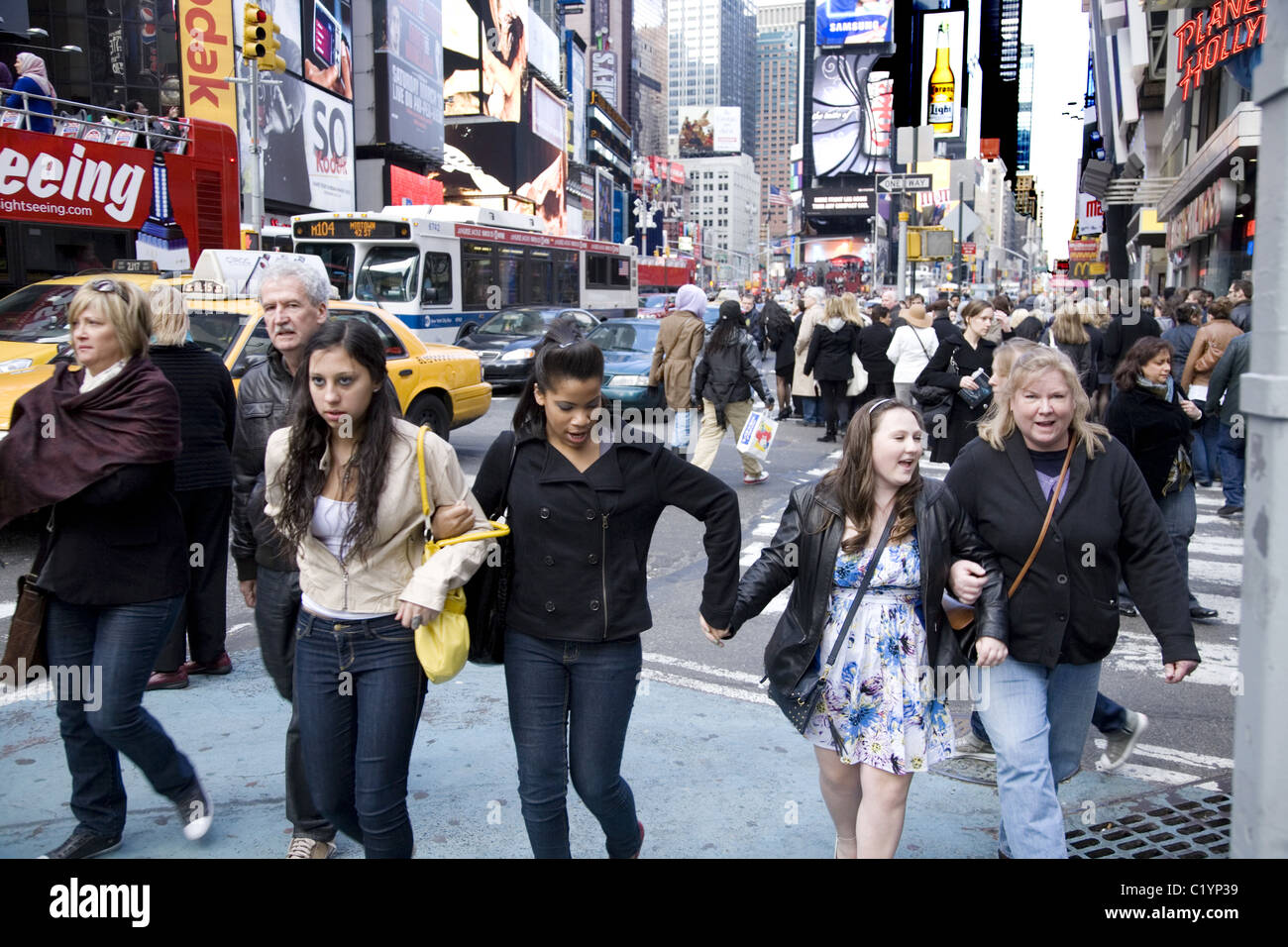 Times Square is always jammed with all sorts of people in New York City Stock Photo