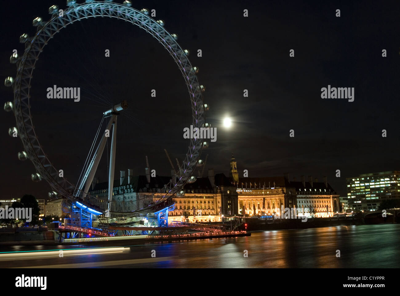 London Eye with County Hall in the background by night Stock Photo - Alamy