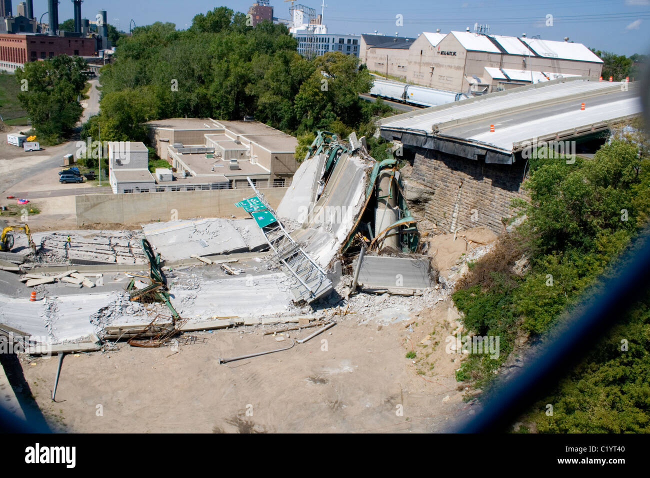 I35W bridge collapsed on the east bank photographed thru fence on 10th