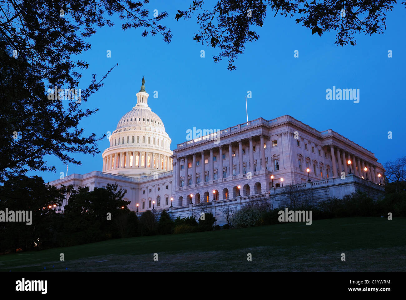 Capitol Hill building panorama at dusk with light and blue sky, Washington DC. Stock Photo