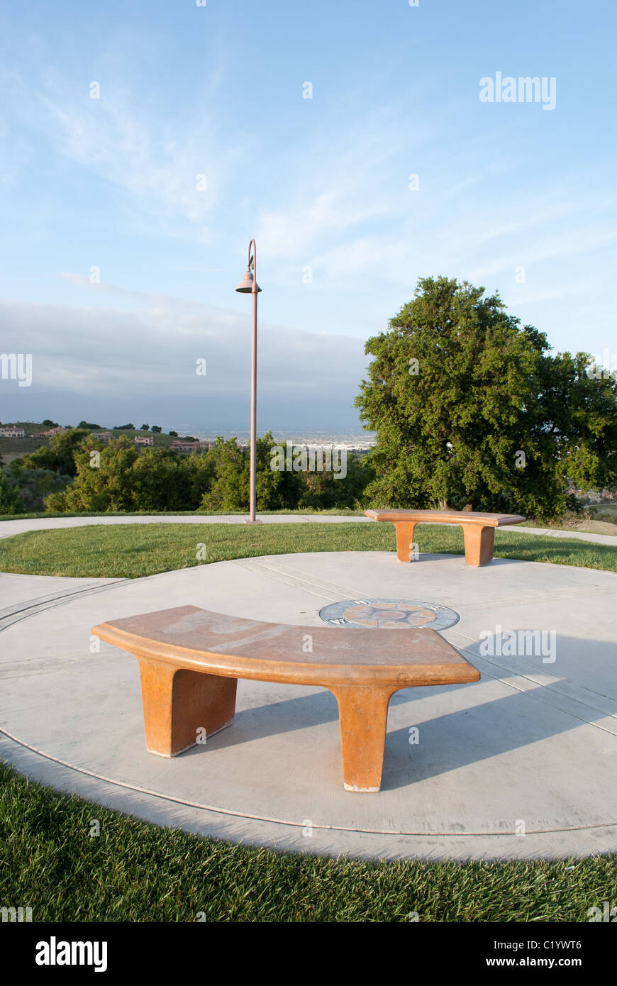 Empty benches in a hillside park Stock Photo - Alamy