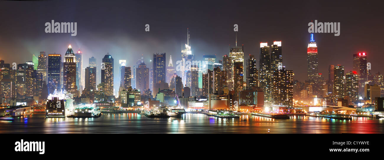 New York City Manhattan skyline panorama at night over Hudson River ...