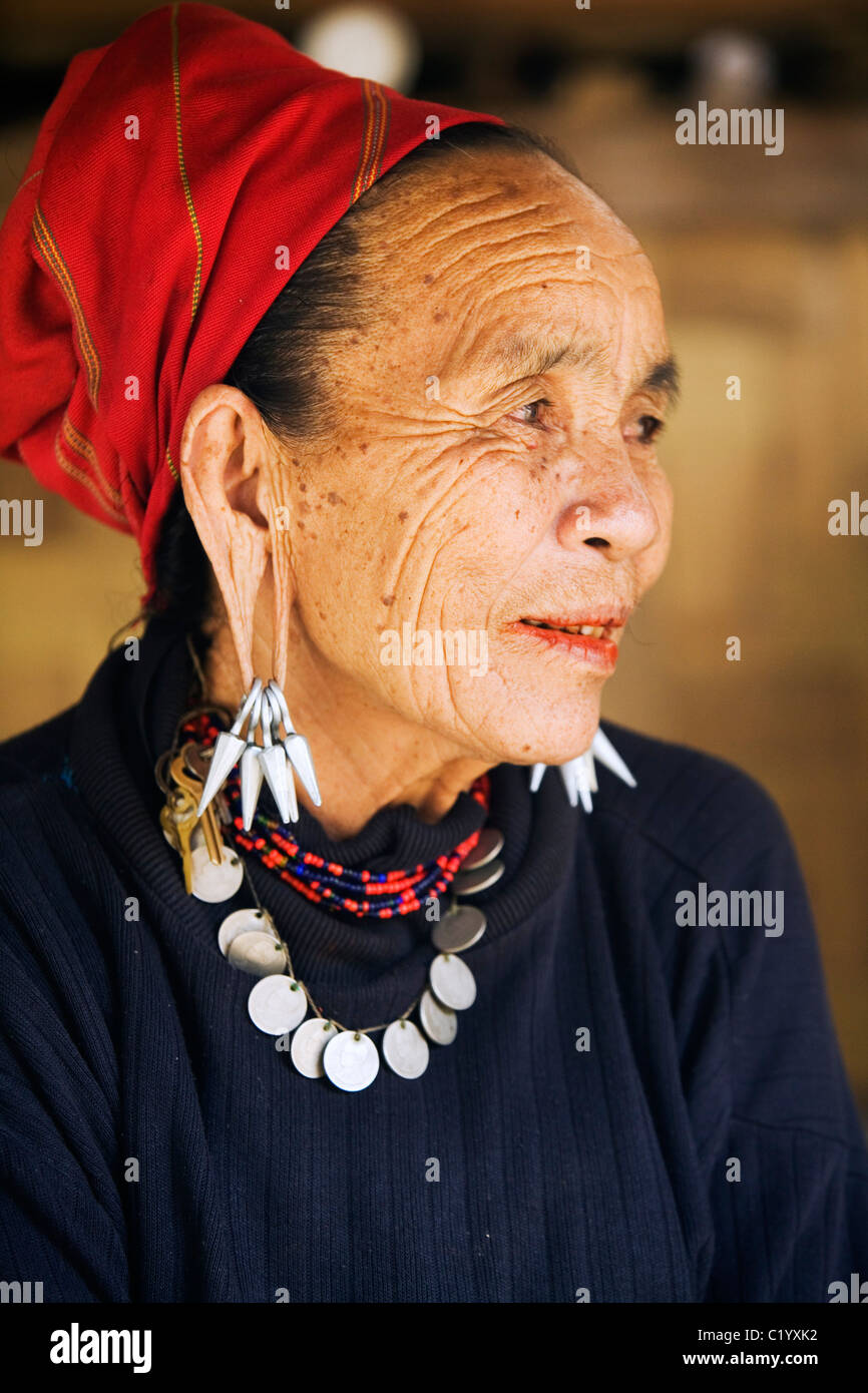 An elderly 'Big Ear' Karen woman at Nai Soi (also known as Nupa Ah) village. Nai Soi, Mae Hong Son province, THAILAND Stock Photo