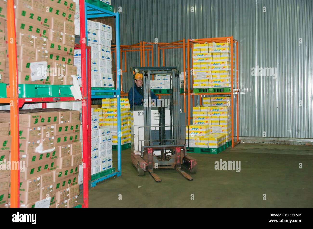 truck loader forklift with full load onpallet in a warehouse in japan company Stock Photo