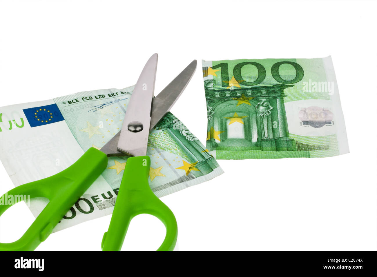 Euro banknotes and scissors Stock Photo