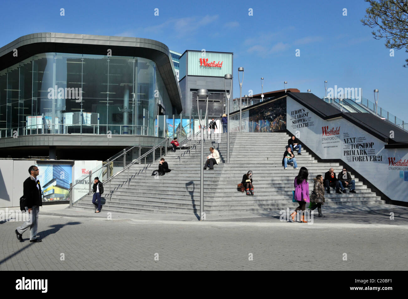 Steps up to Westfield Stratford shopping centre beside additional glass  fronted entrance to Stratford public transport train railway station London  UK Stock Photo - Alamy