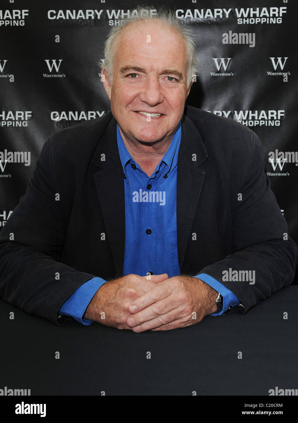 Rick Stein signs copies of his book 'Rick Stein's Far Eastern Odyssey' at Waterstones in Canary Wharf London, England - Stock Photo