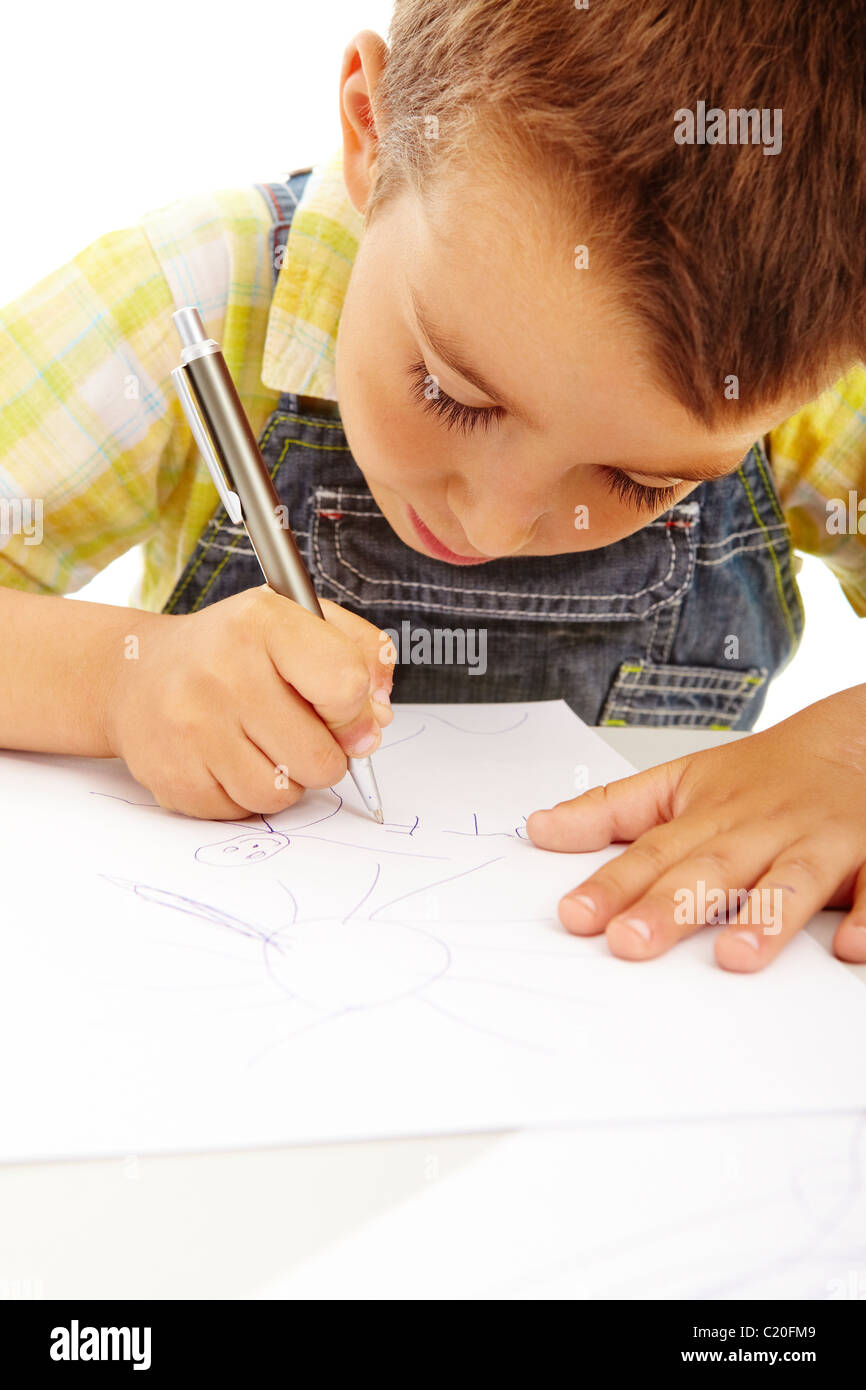 Portrait of a little boy drawing isolated on white Stock Photo