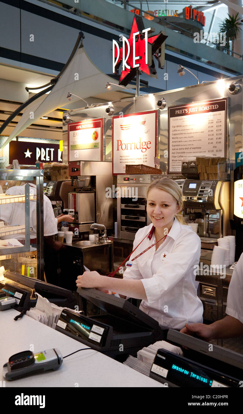 Welcoming staff at the Pret a manger cafe / restaurant in departures, terminal 5, Heathrow airport London UK Stock Photo