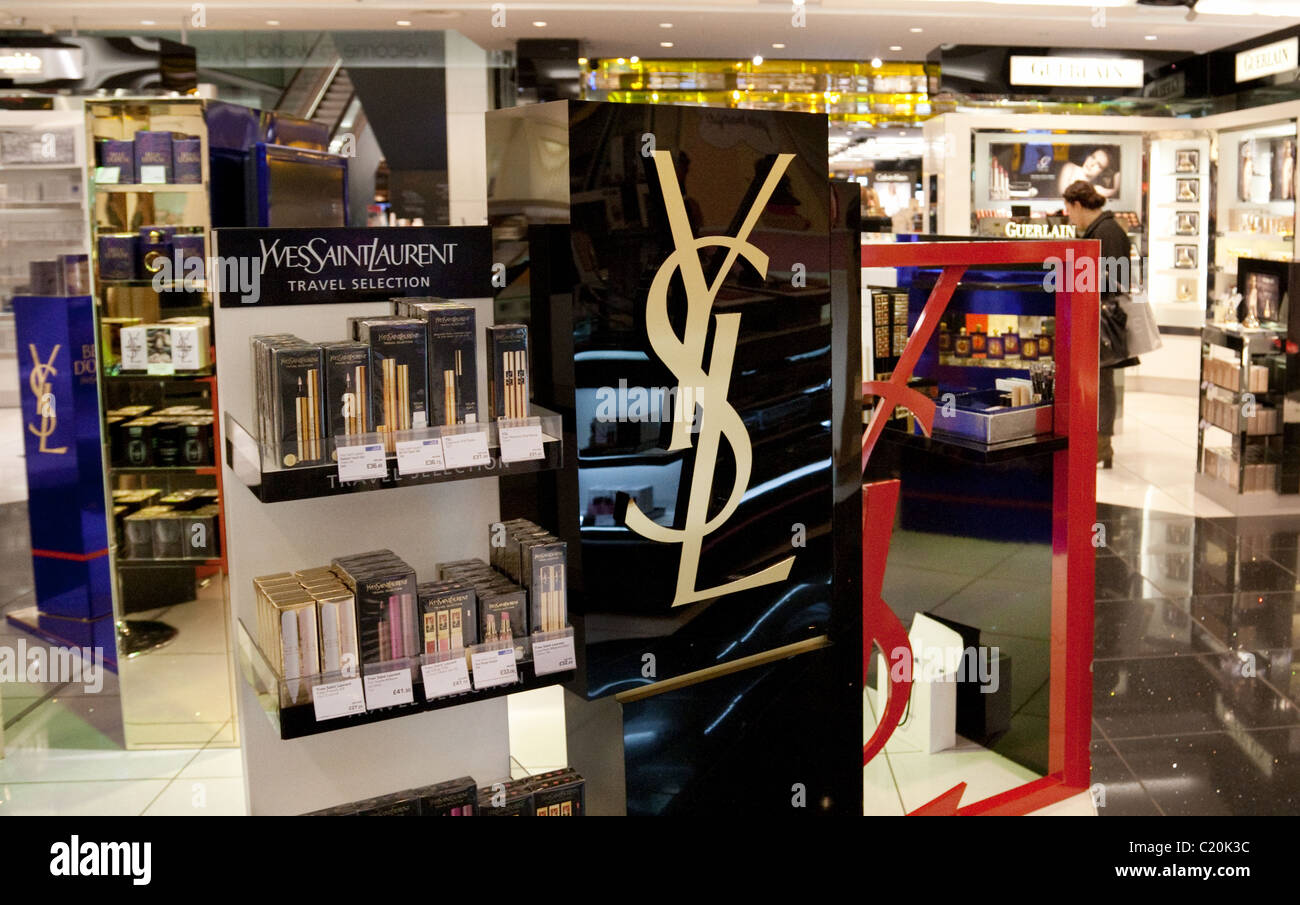Yves Saint Laurent shop in the Duty Free shopping area, terminal 5 Stock Photo - Alamy
