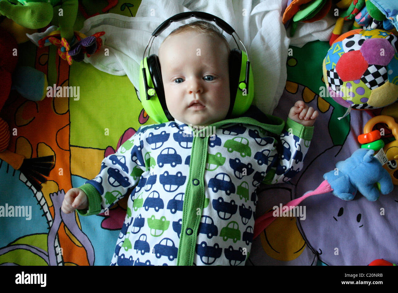 baby in headphones Stock Photo - Alamy