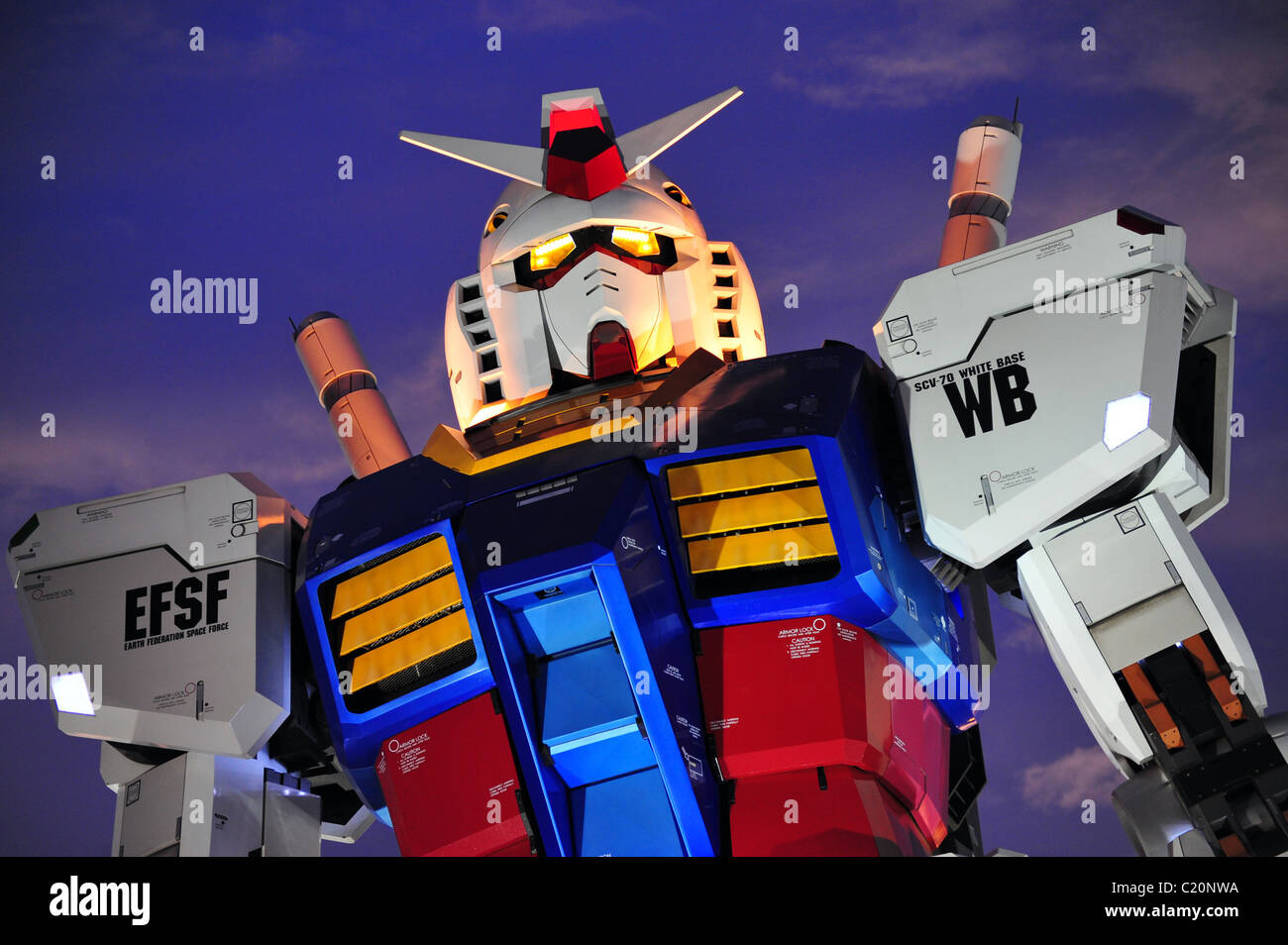 Giant Robot towers over Tokyo To celebrate the 30th anniversary of the  Mobile Suit Gundam anime, a giant Gundam robot statue Stock Photo - Alamy