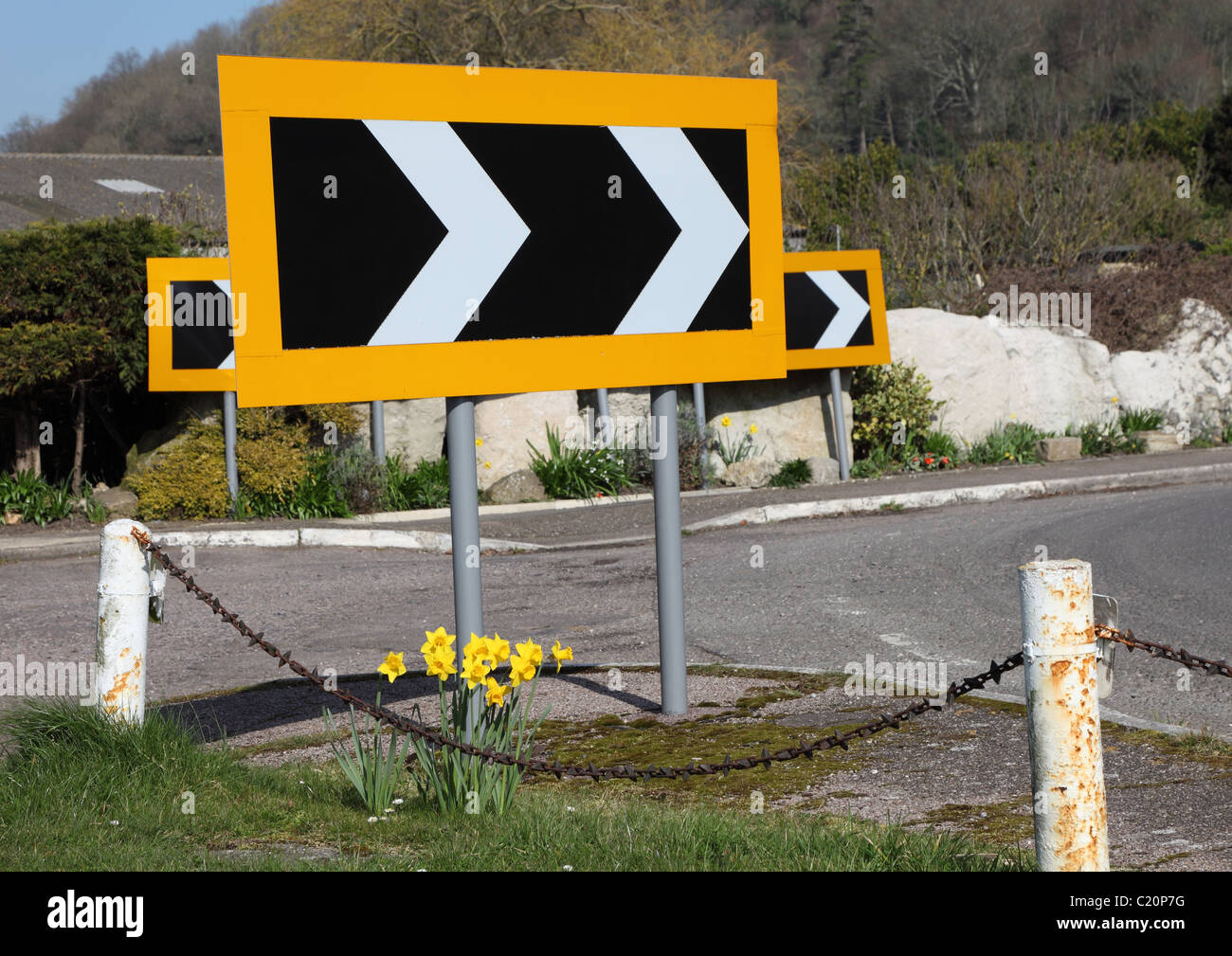 Keep right signs. Road bends to right. Stock Photo