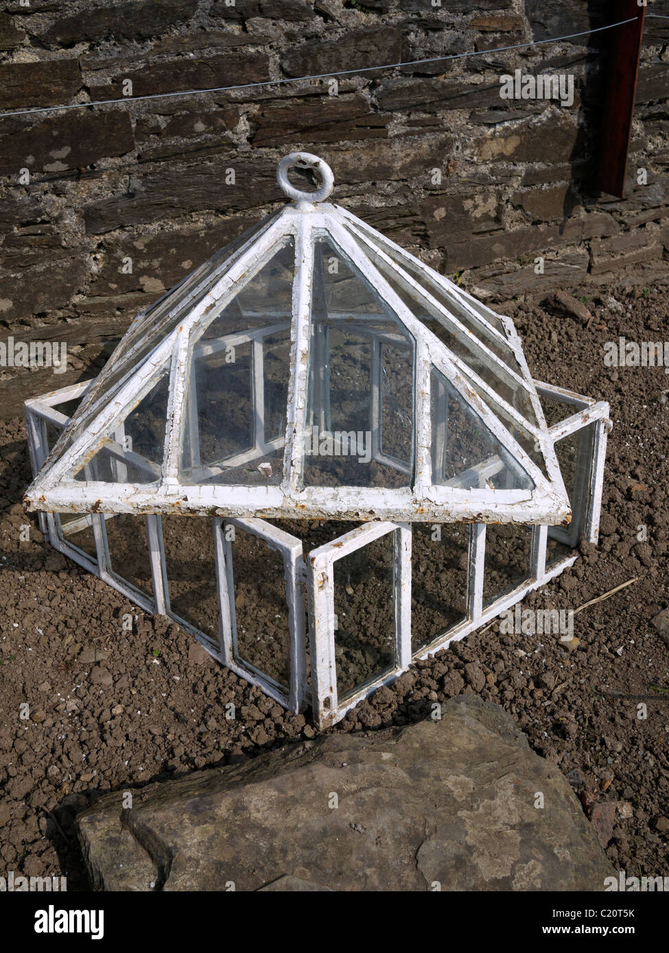 Small cold frame or cloche used to protect plants Lost Garden of Heligan  St Austell Cornwall UK Stock Photo