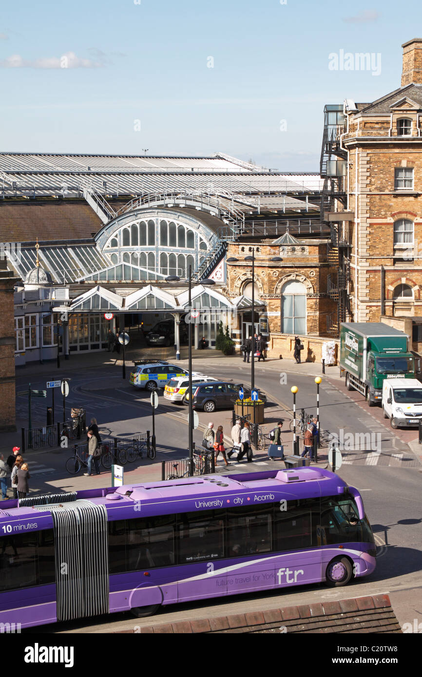 A ftr bendy bus outside York Railway Station, York, North Yorkshire, England, UK. Stock Photo