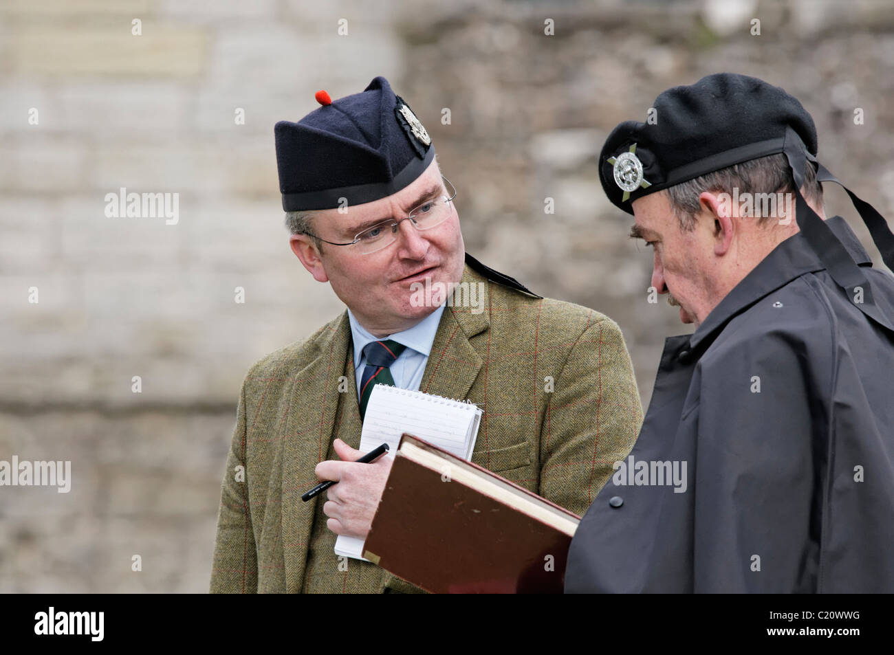 Pipes and drums band judges consulting at a competition, Stirling
