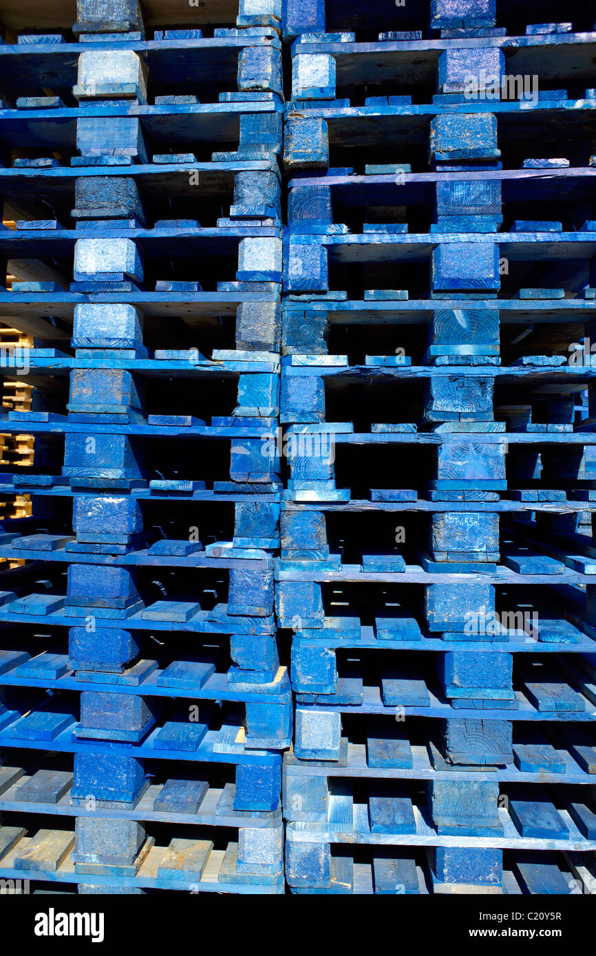 Stack of blue wooden pallets, stacks Stock Photo Alamy
