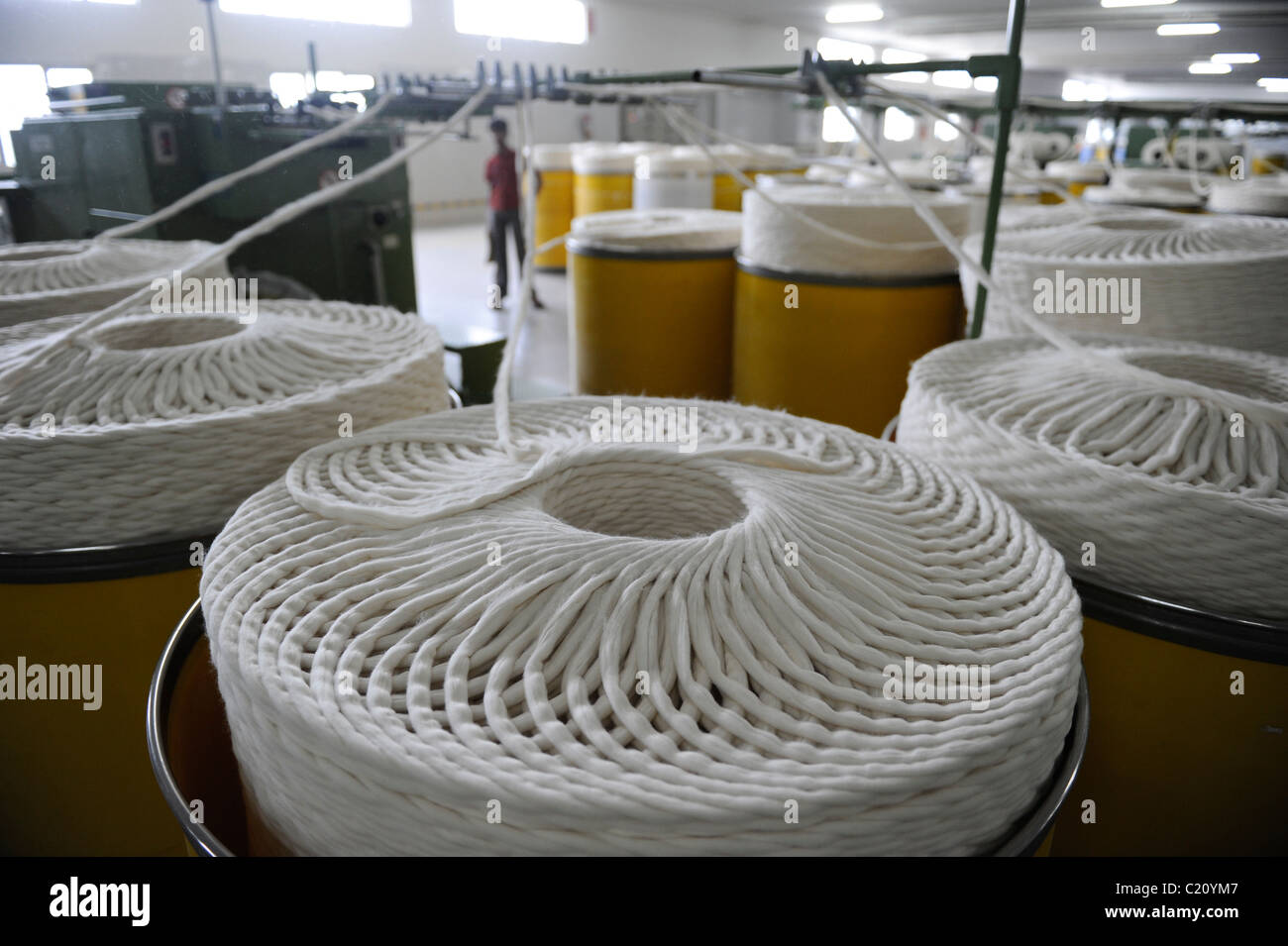 INDIA Tirupur , spinning of fair trade and organic cotton yarn at spinning unit Stock Photo