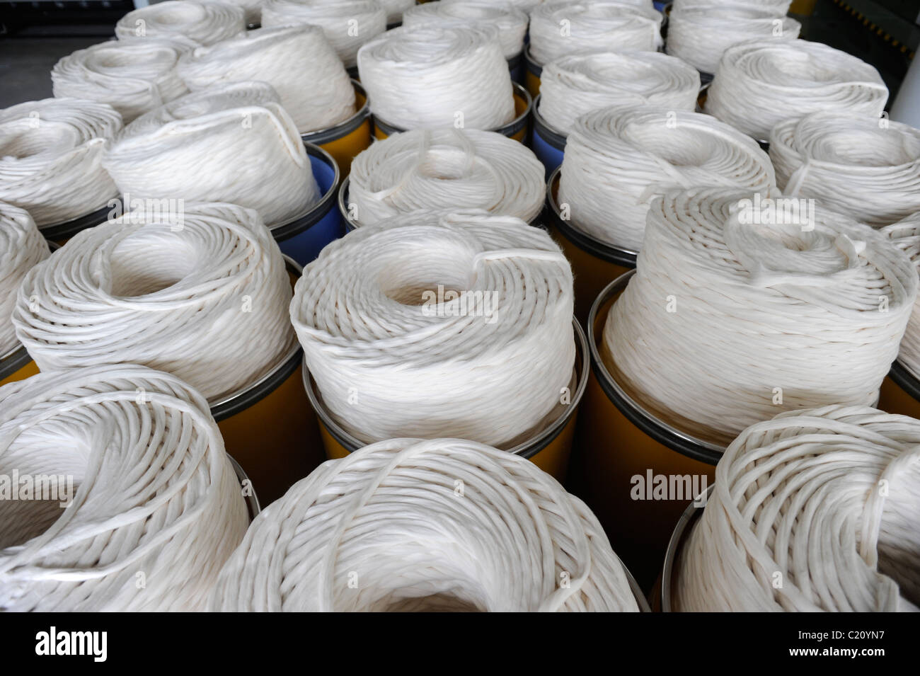 INDIA Tirupur , spinning of fair trade and organic cotton yarn at spinning unit Stock Photo