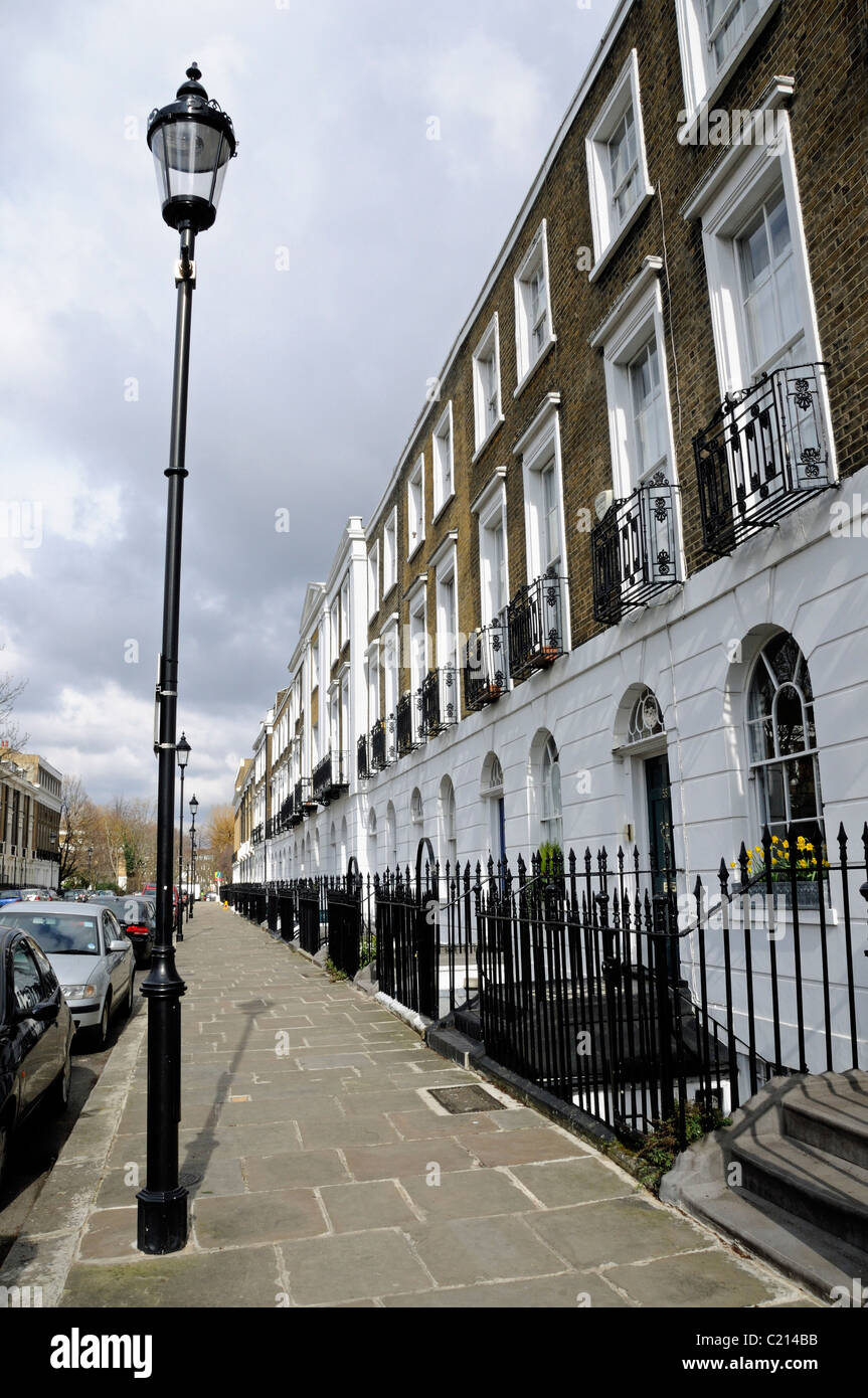 Terrace of houses with lamppost Gibson Square Islington London