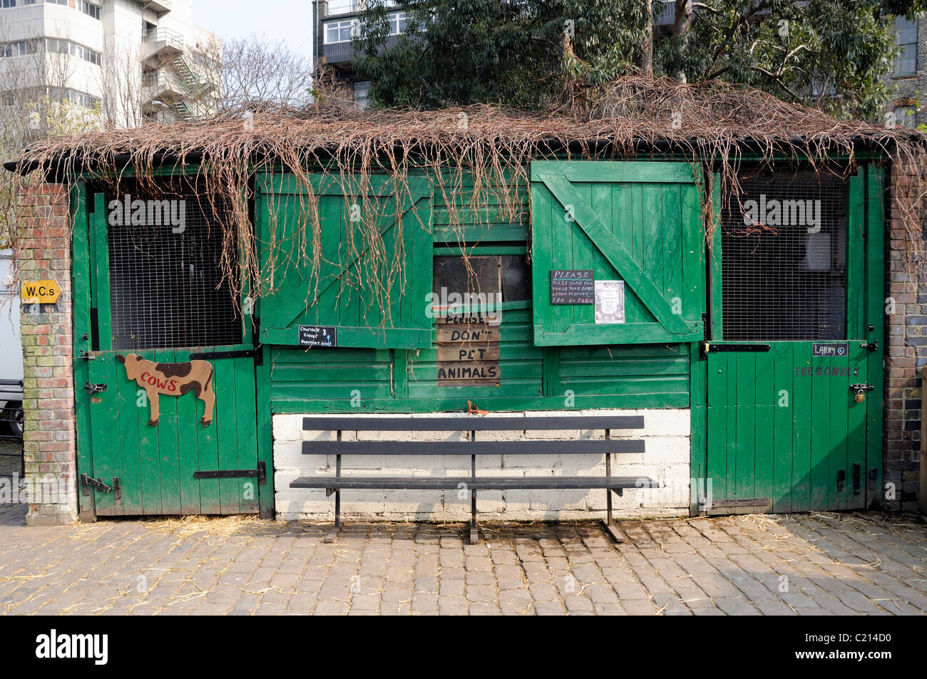 Animal Housing, donkey stable and cow shed Hackney City Farm London England UK Stock Photo