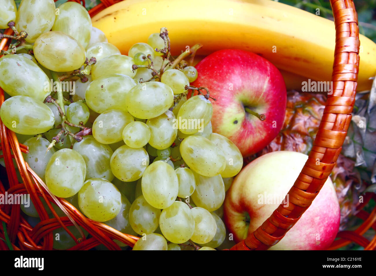 much sweet fruits in basket Stock Photo Alamy