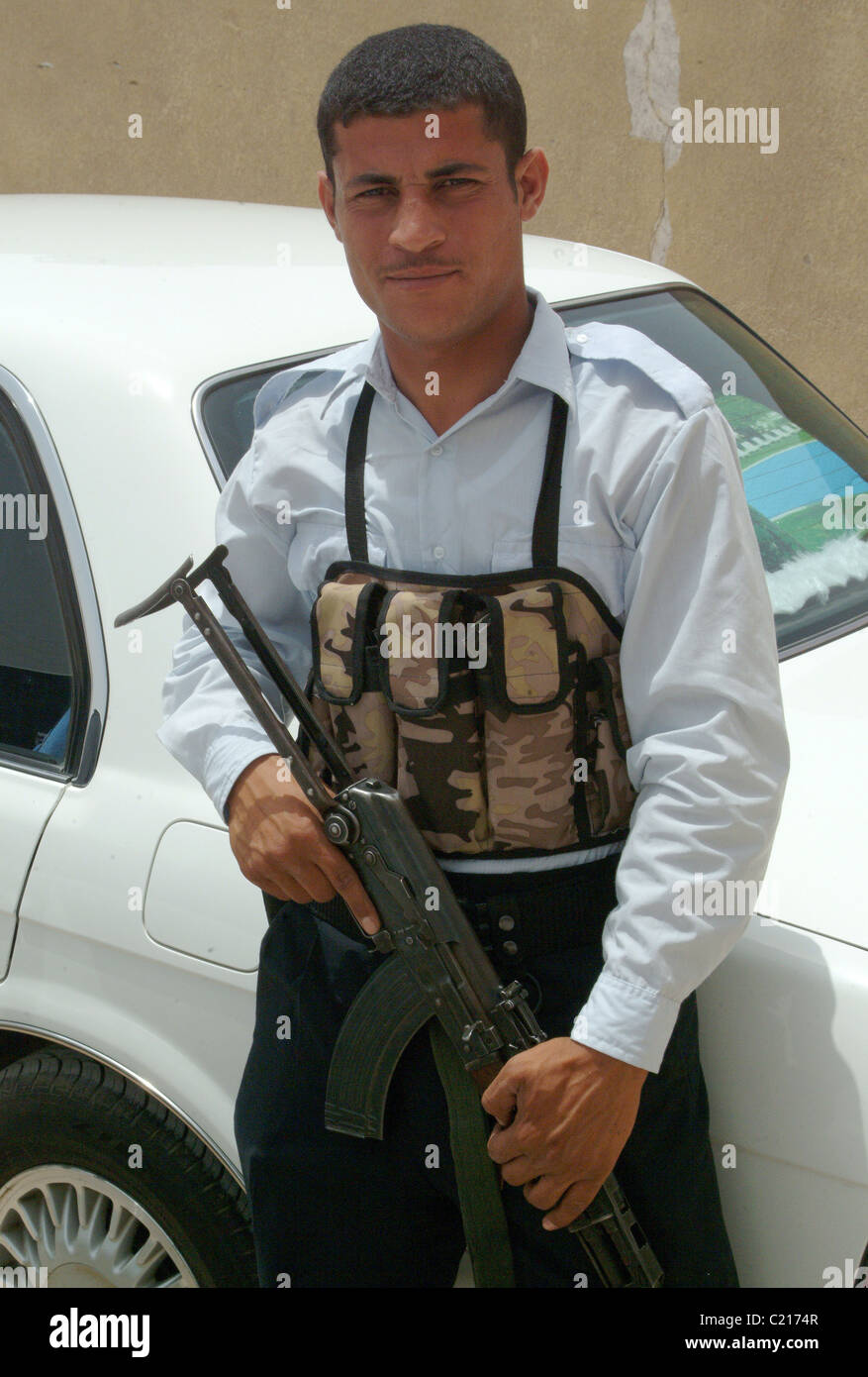 Iraqi security police with Kalashnikov Stock Photo