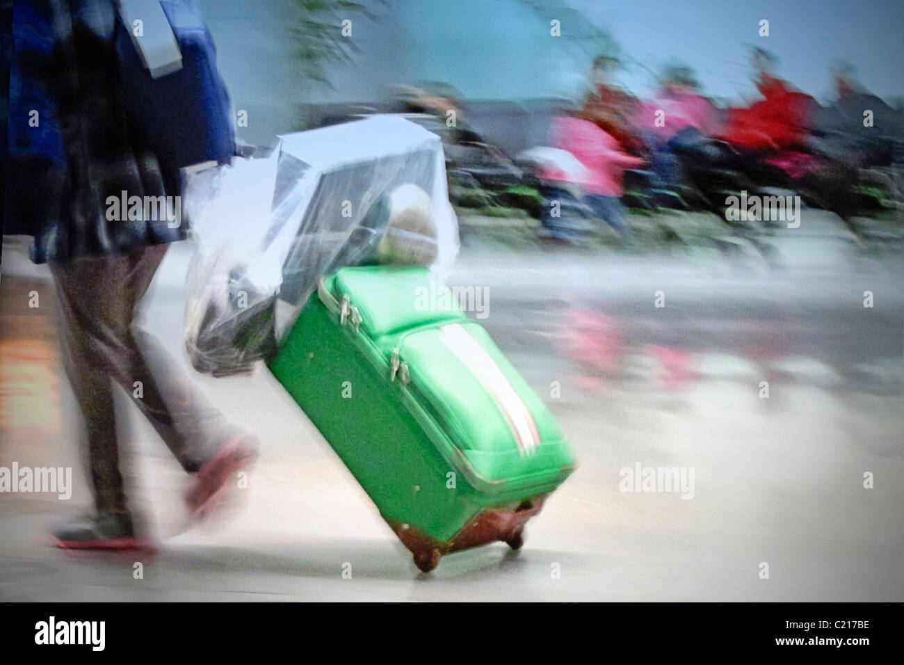Airport Passenger pulling Luggage Cart at the San Francisco International Airport, California