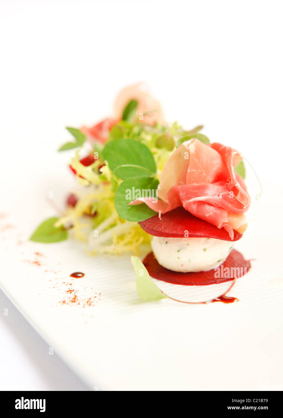 Salad of goats cheese, parma ham and beetroot Stock Photo Alamy