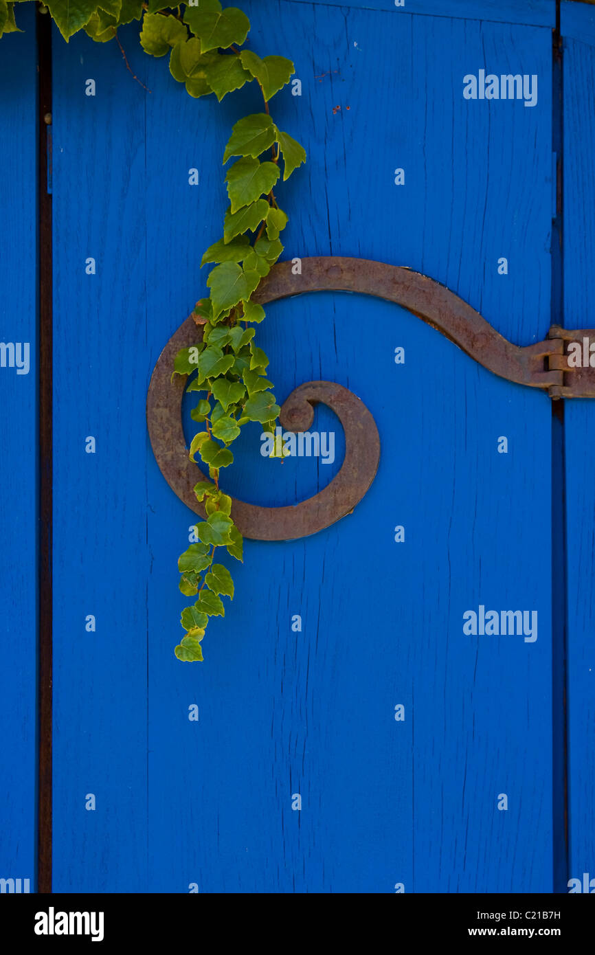 Artistic shot of a shutter hinge in a French village Stock Photo