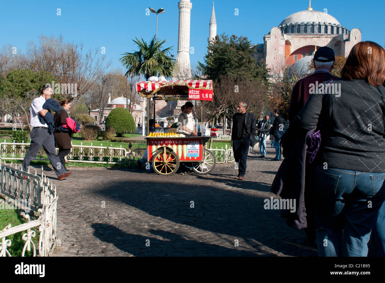 Man selling boiled corn with trolley in front of Hagia Sophia Stock Photo