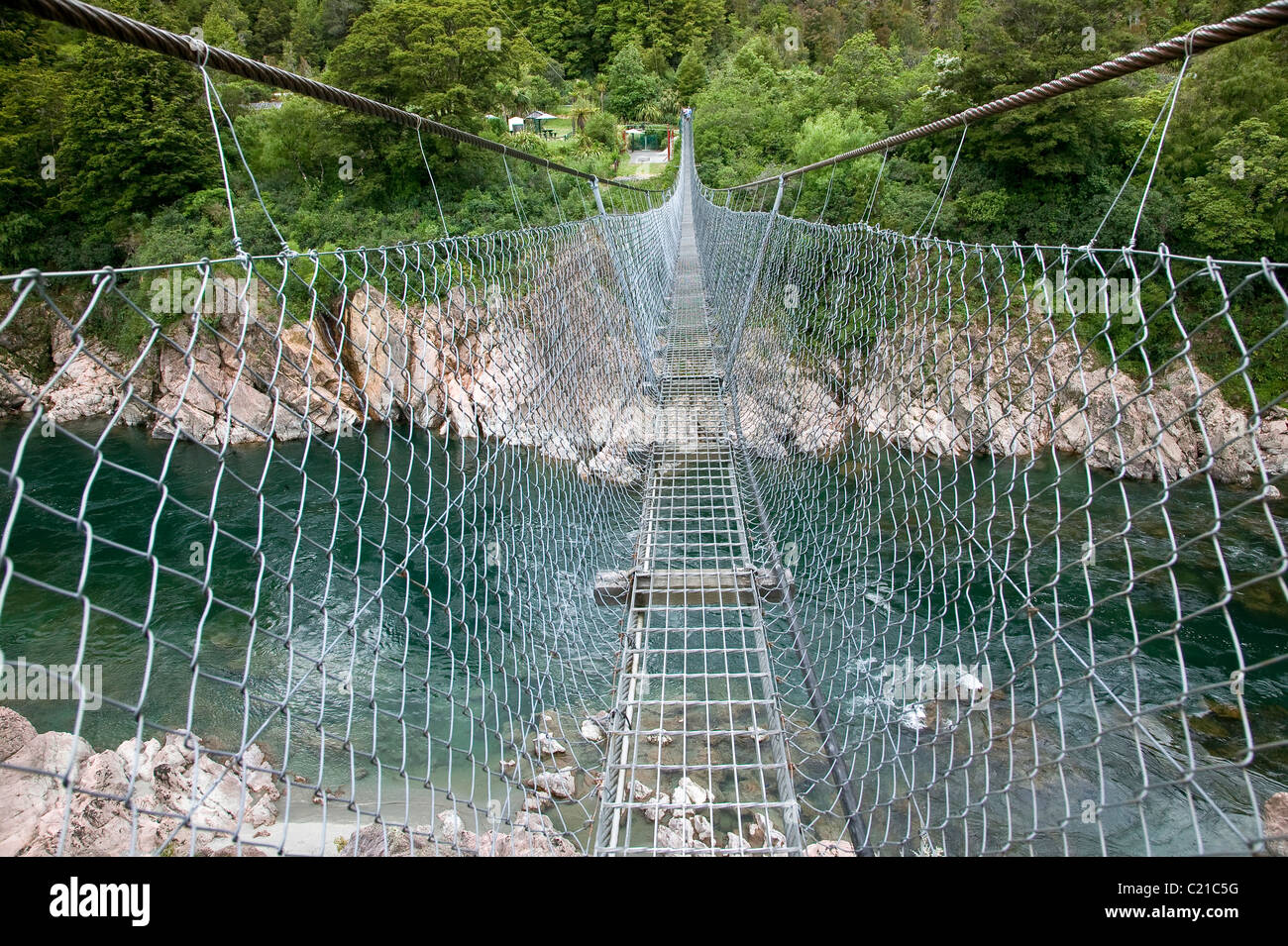 Swing bridge Buller Gorge river New Zealand, South Island Stock Photo