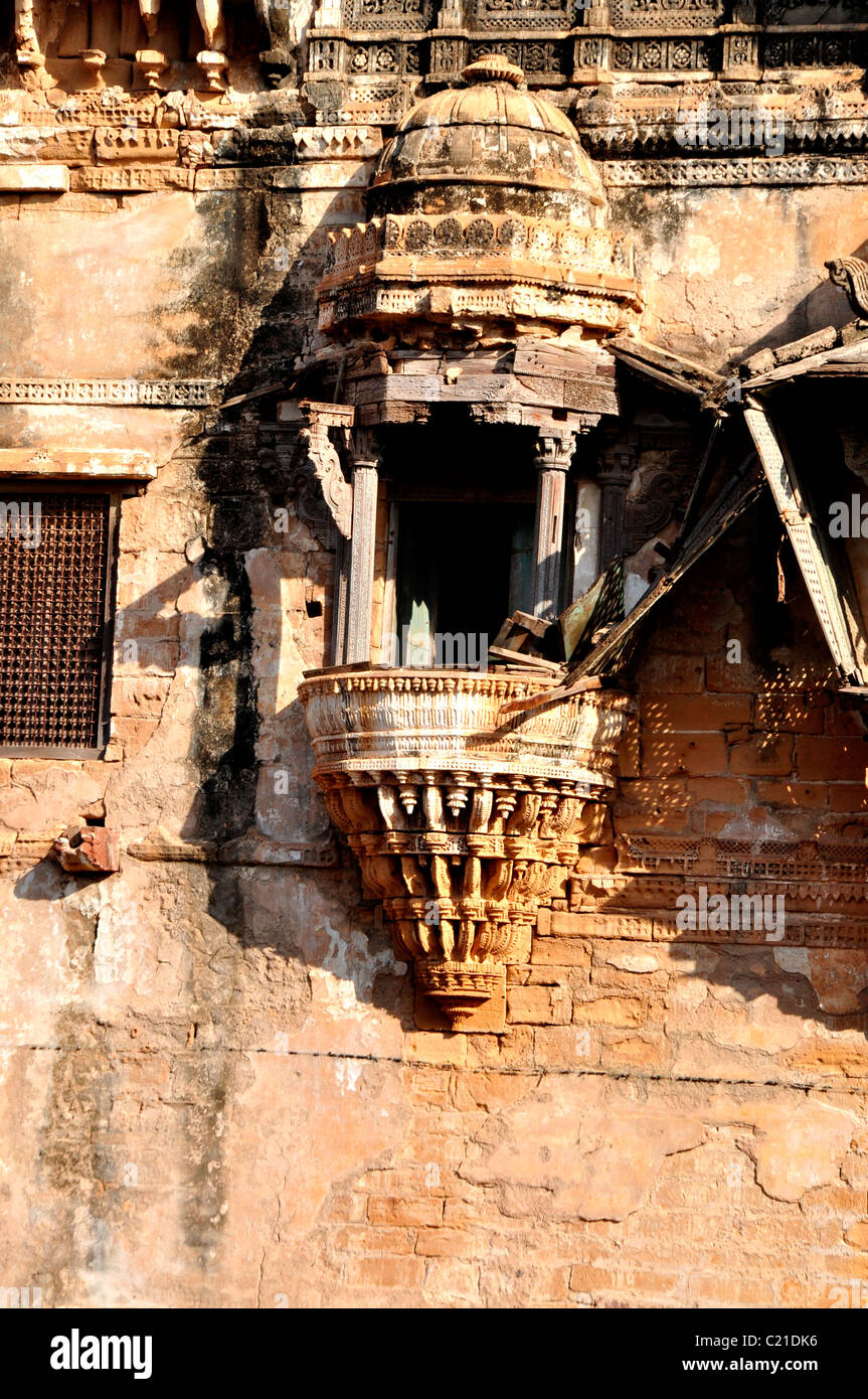 An old broken window of a heritage Palace in Gujarat, India Stock Photo